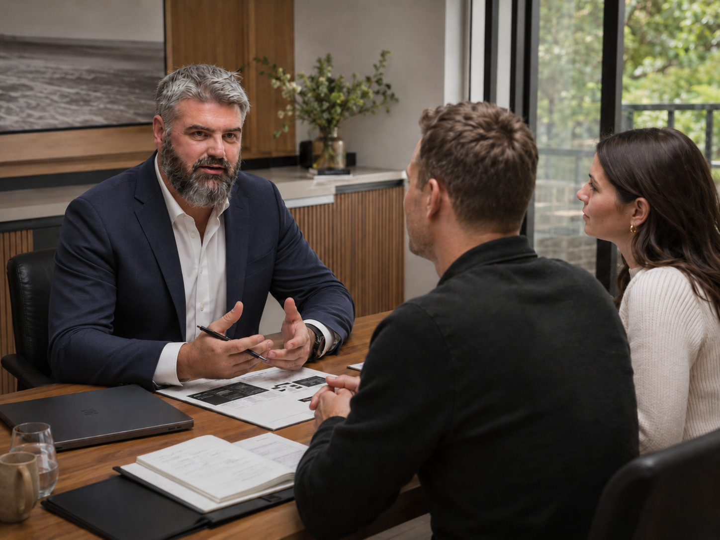 Cameron Whinnett advising business owners in a working session.